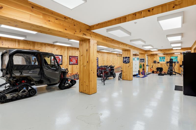 The barn's lower level, with room for cars and equipment